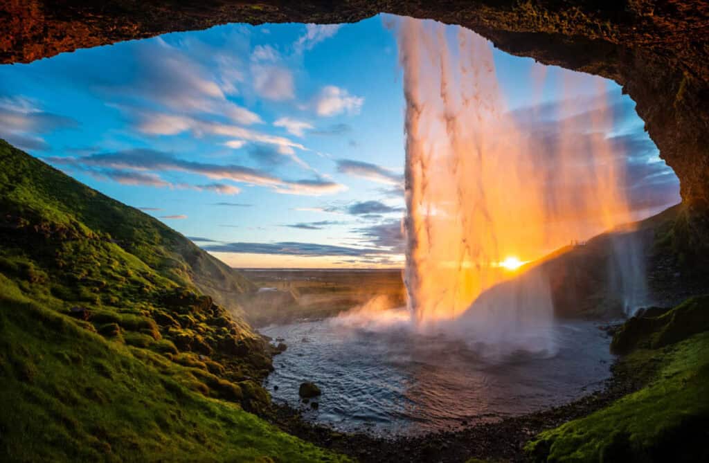 Sunset from behind Seljalandsfoss in Iceland